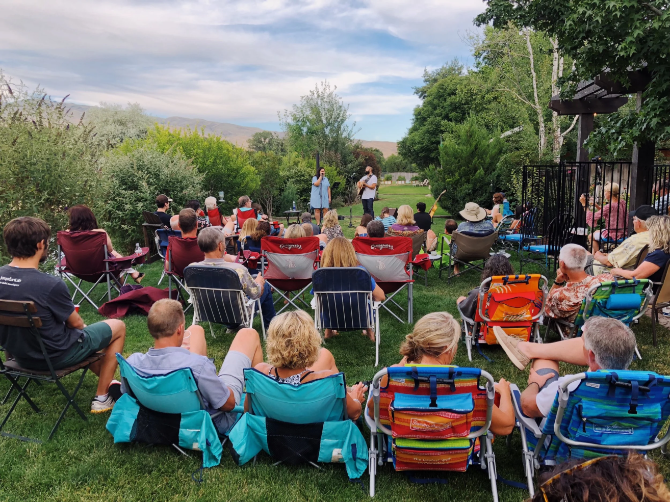 Guests enjoying an intimate acoustic house concert